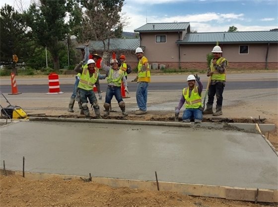 Crew Pouring Driveway